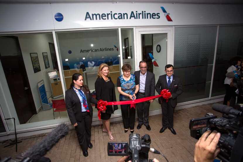 American Airlines Regional Sales Director Christine Valls, second from left, Regional...