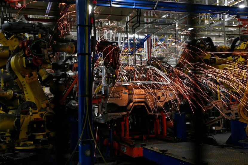 
An SUV body is welded together using robots at the GM Plant in Arlington, Texas May 1, 2015. 
