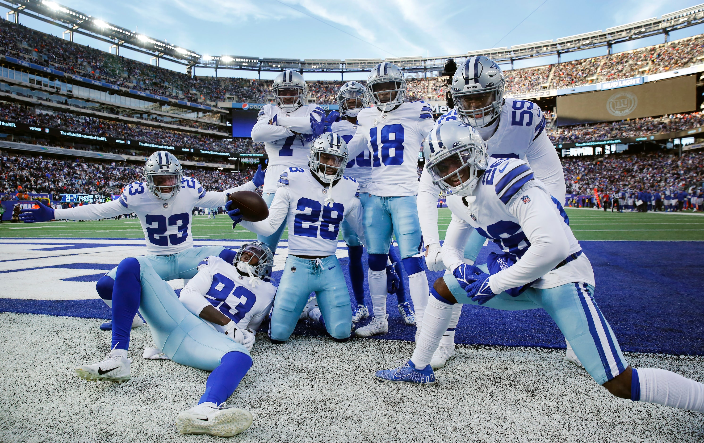 Dallas Cowboys safety Malik Hooker (28) and his defensive teammate pose for a photo after...