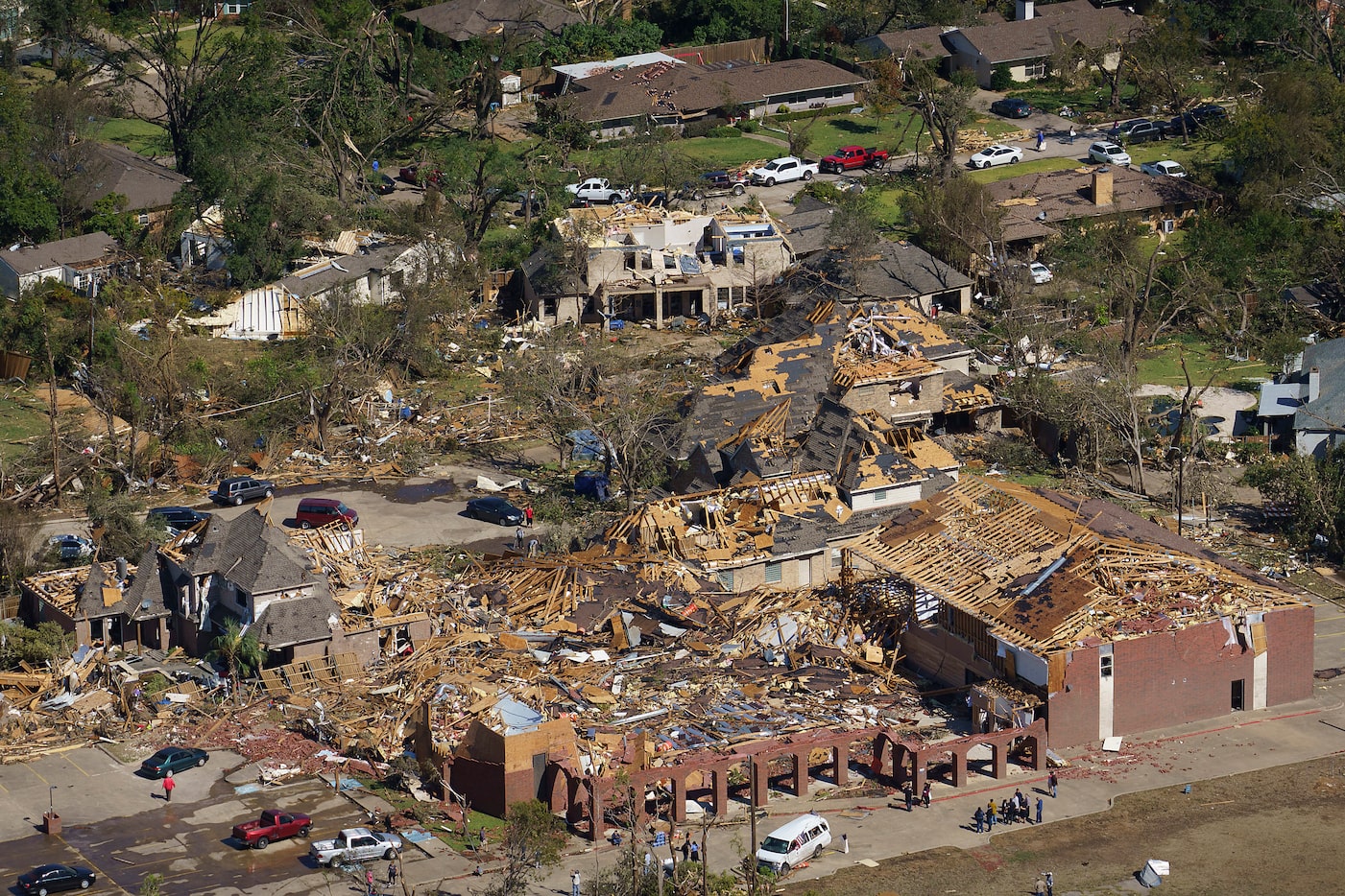 Damage to Primera Iglesia Bautista Mexicana church (bottom) just off  Walnut Hill Lane and...