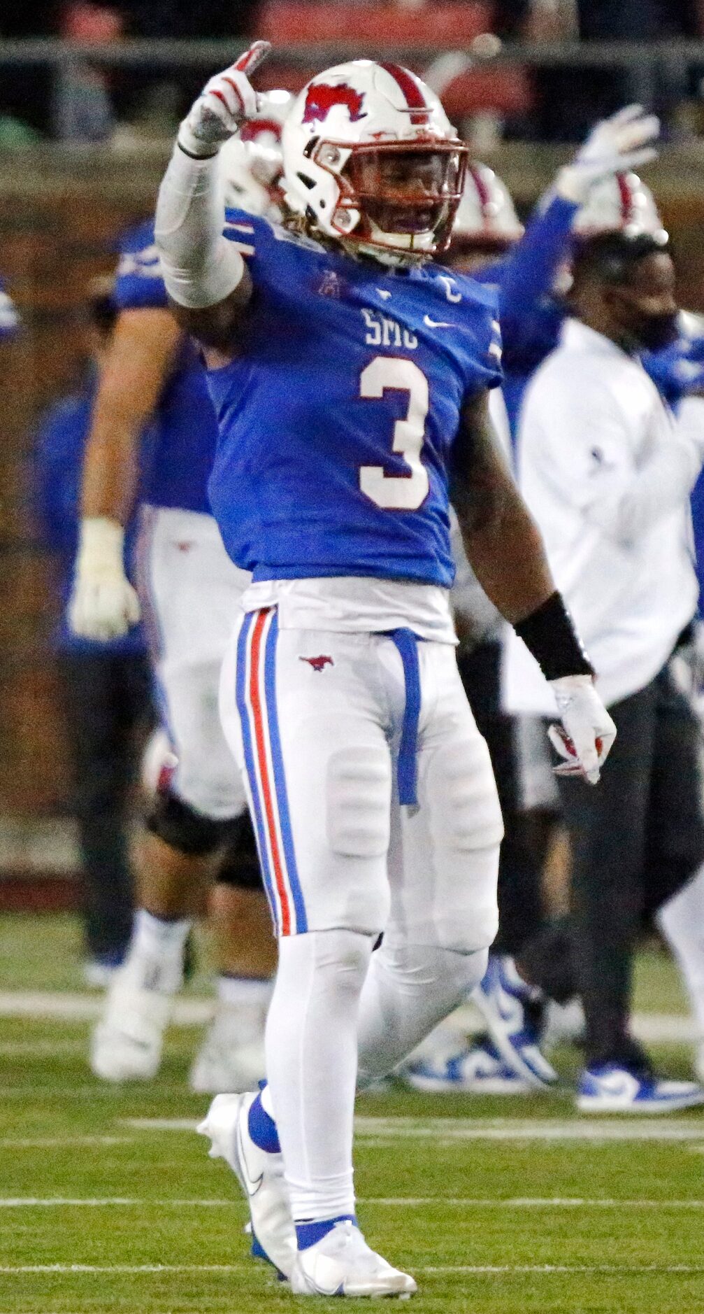 Southern Methodist Mustangs linebacker Delano Robinson (3) celebrates a fumble recovery...