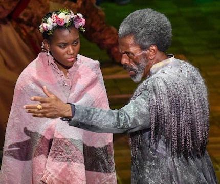 Trinity Hawkins, left, plays Miranda and Andre de Shields plays Prospero in Dallas Theater...