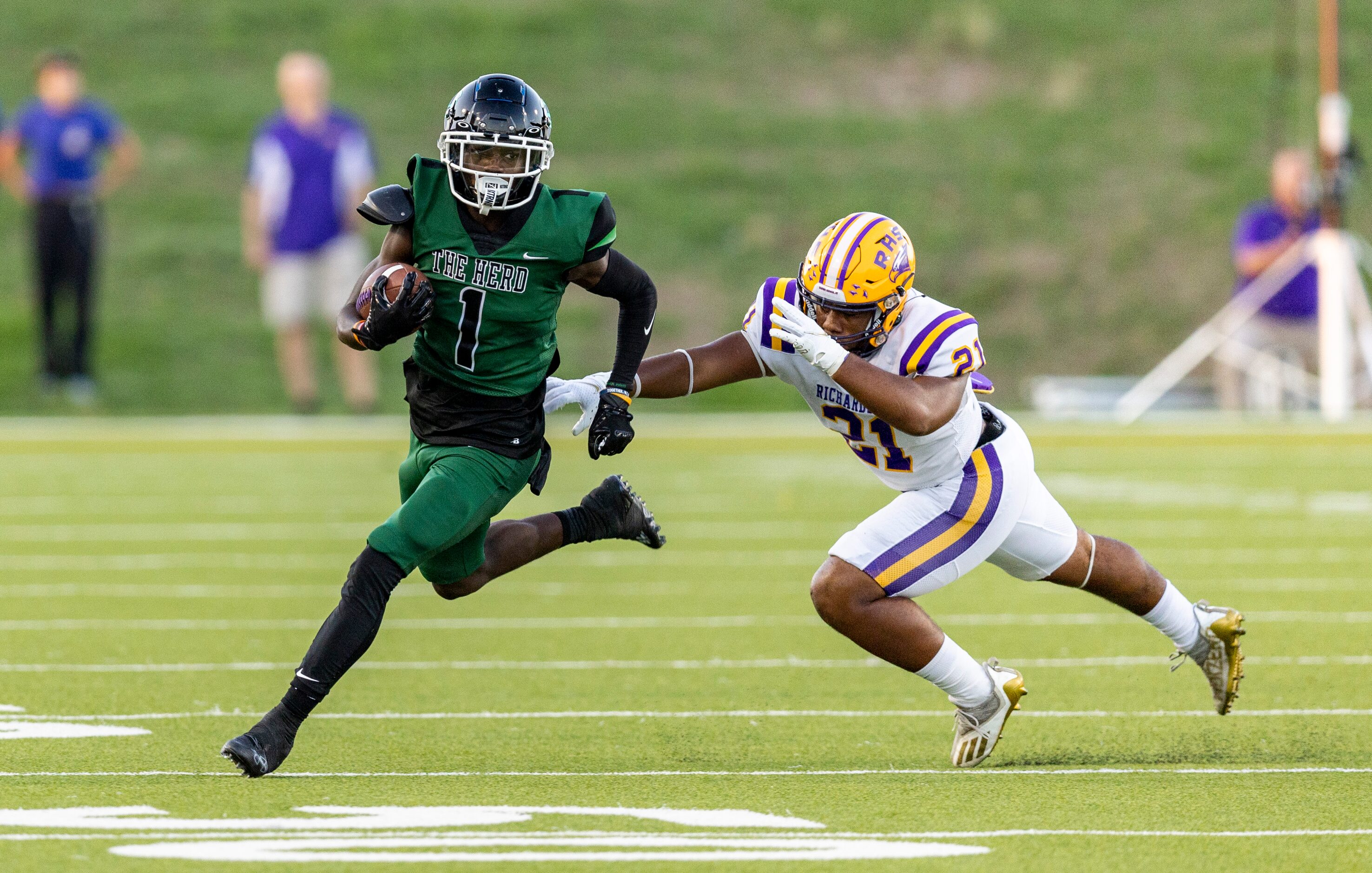 Berkner sophomore wide receiver Kobi Foreman (1) evades a tackle from Richardson junior...