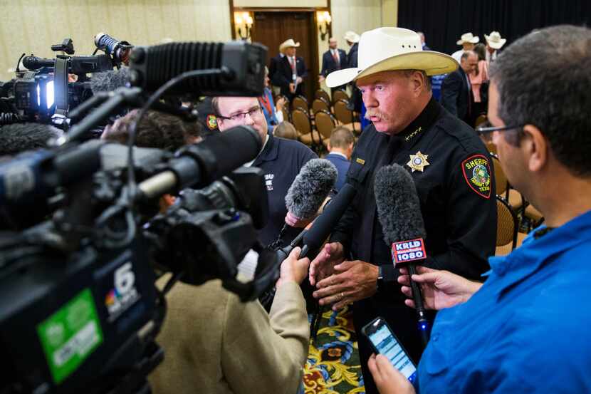 Tarrant County Sheriff Bill E. Waybourn is interviewed by reporters after 18 Texas sheriffs...