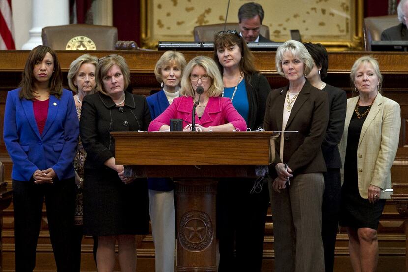 State Rep. Jodie Laubenberg, R-Parker, center, during the second reading of SB5 on the House...