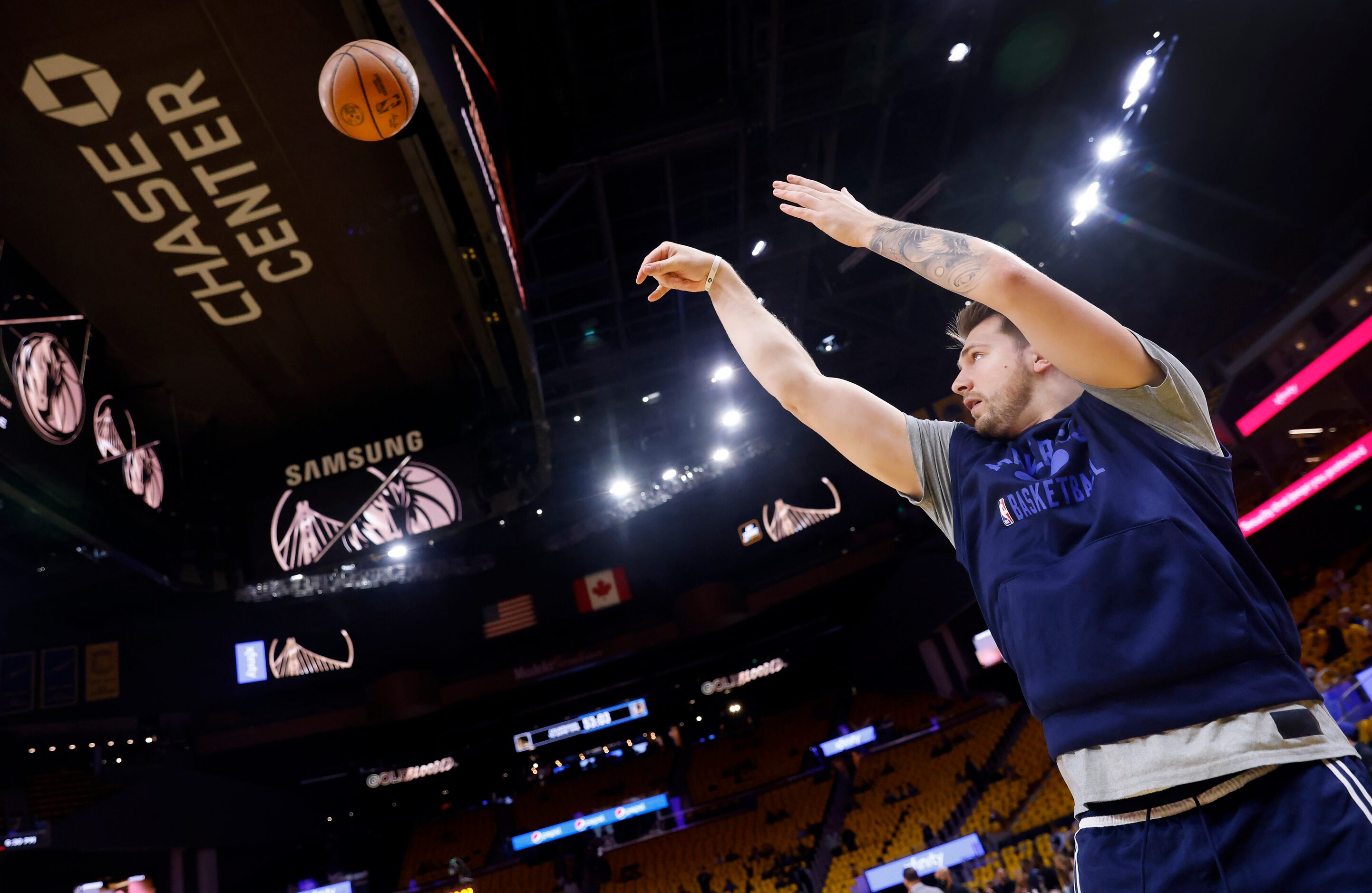 Dallas Mavericks guard Luka Doncic warms up his three-point shooting before facing the...