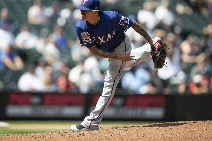 SEATTLE, WA - MAY 29: Reliever Jesse Chavez #53 of the Texas Rangers delivers a ptich during...