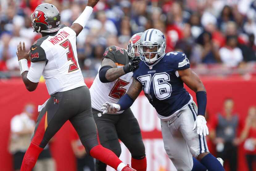 Dallas Cowboys defensive end Greg Hardy (76) pass rushes Tampa Bay Buccaneers quarterback...