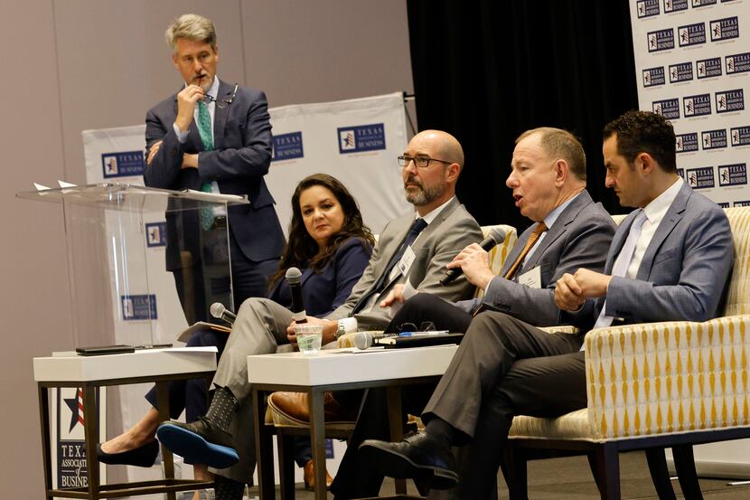 John Schreck, CEO of Texas Institute for Electronics, second from right, speaks during a...