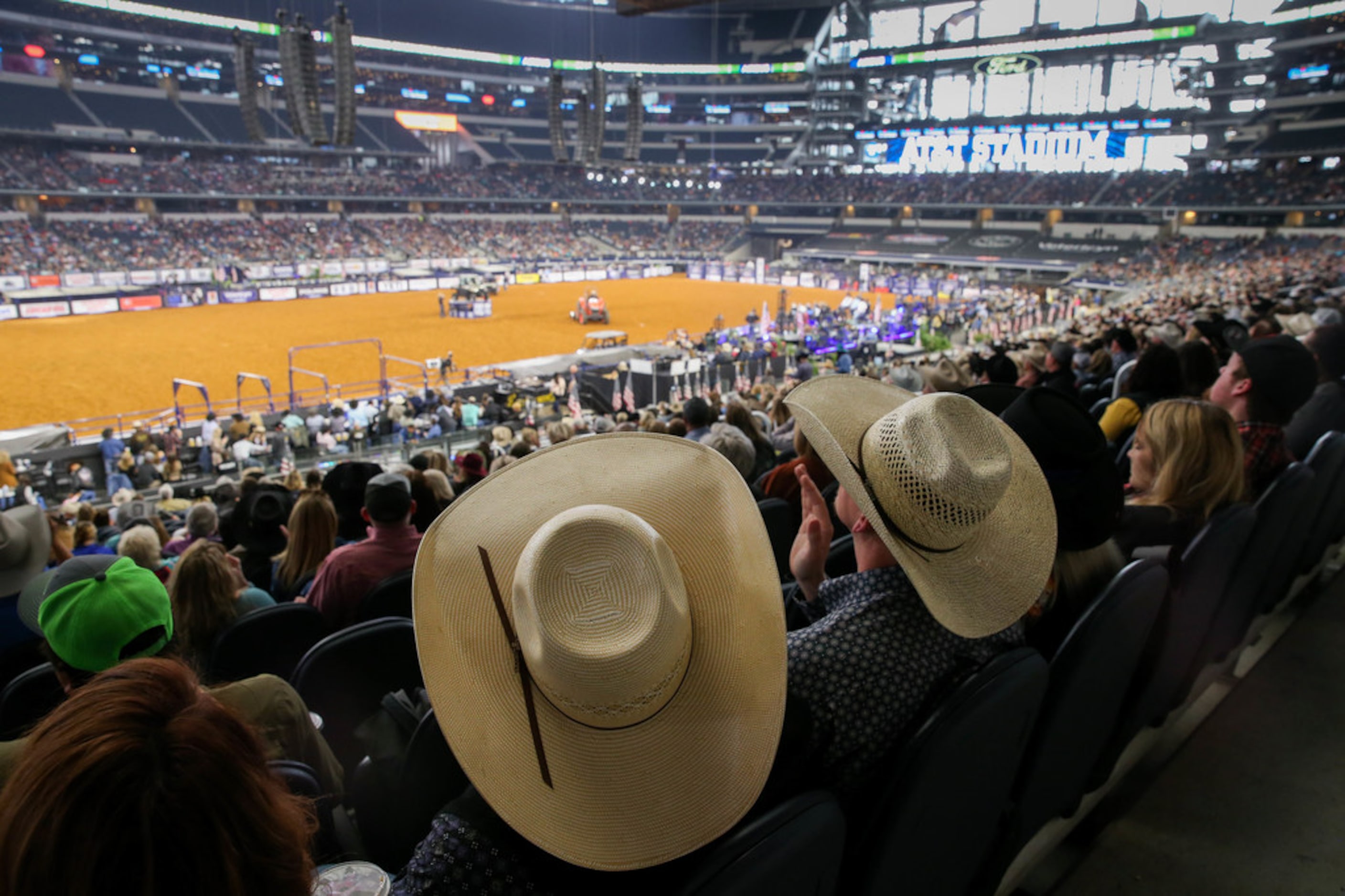 Fans watch the RFD-TV's The American rodeo at AT&T Stadium on March 8, 2020 in Arlington....