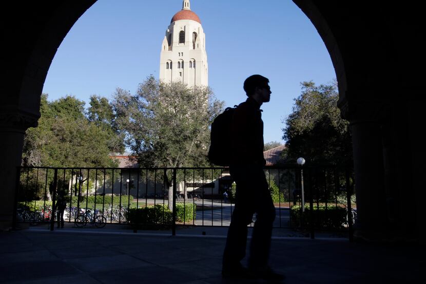 FILE - In this Feb. 15, 2012 file photo, a Stanford University student walks in front of...