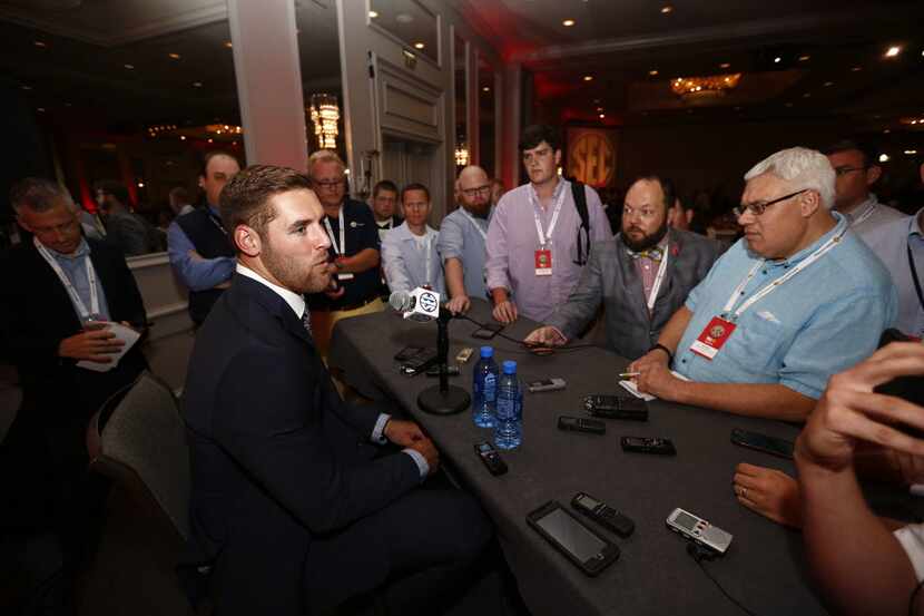 FILE - In this July 12, 2016, file photo, Texas A&M quarterback Trevor Knight speaks to the...