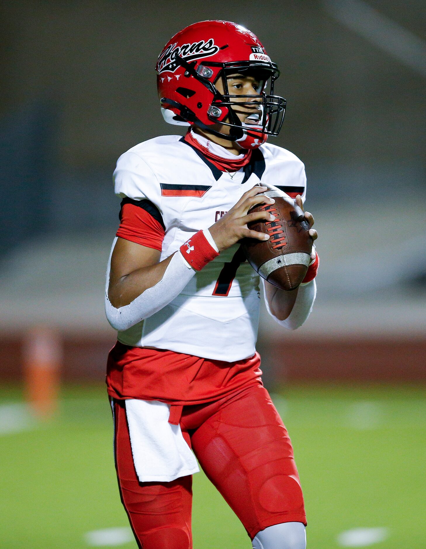 Cedar Hill senior quarterback Kaidon Salter (7) looks for an open receiver during the first...