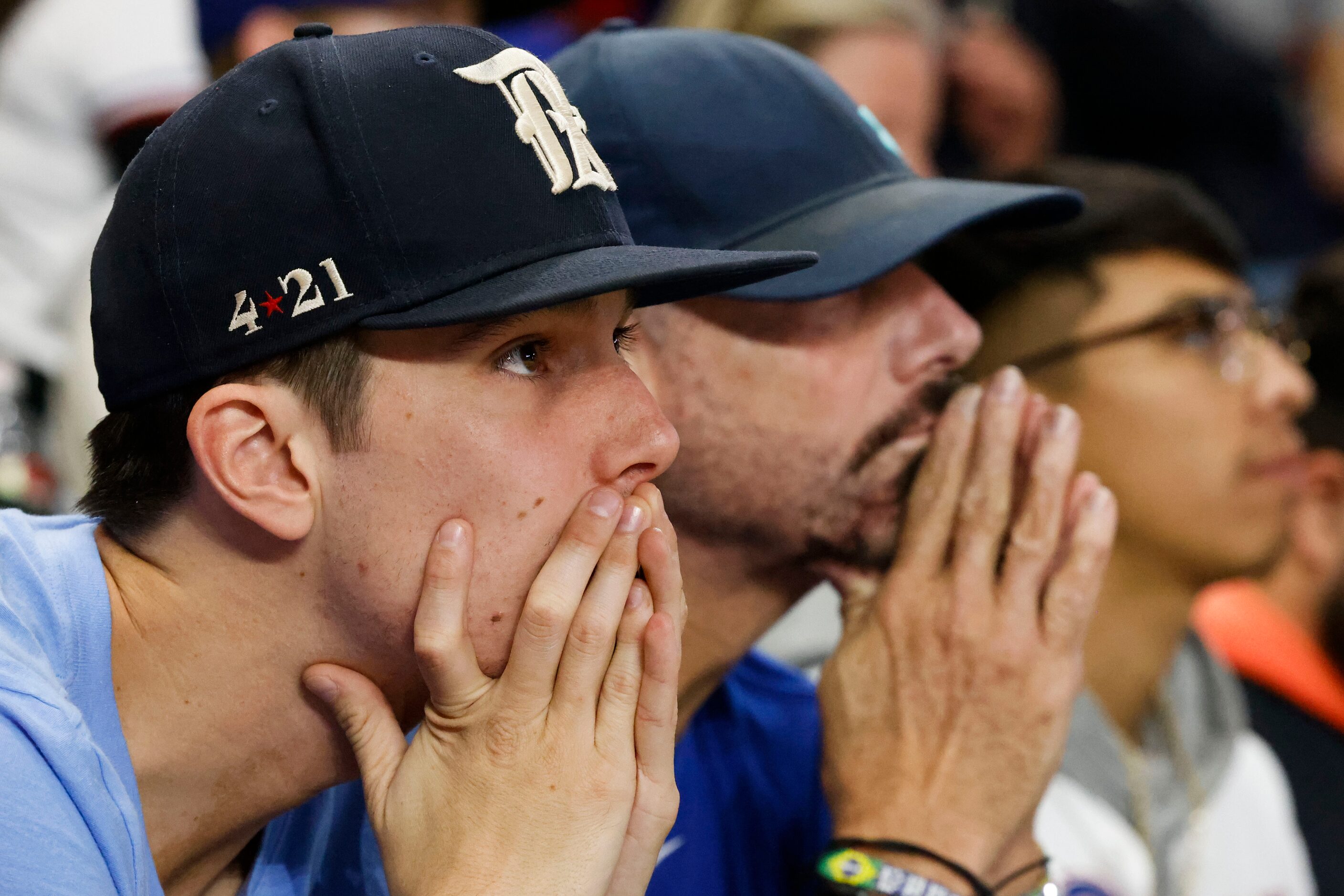 Texas Rangers fans reacts during the sixth inning of a World Series Game 5 watch party at...