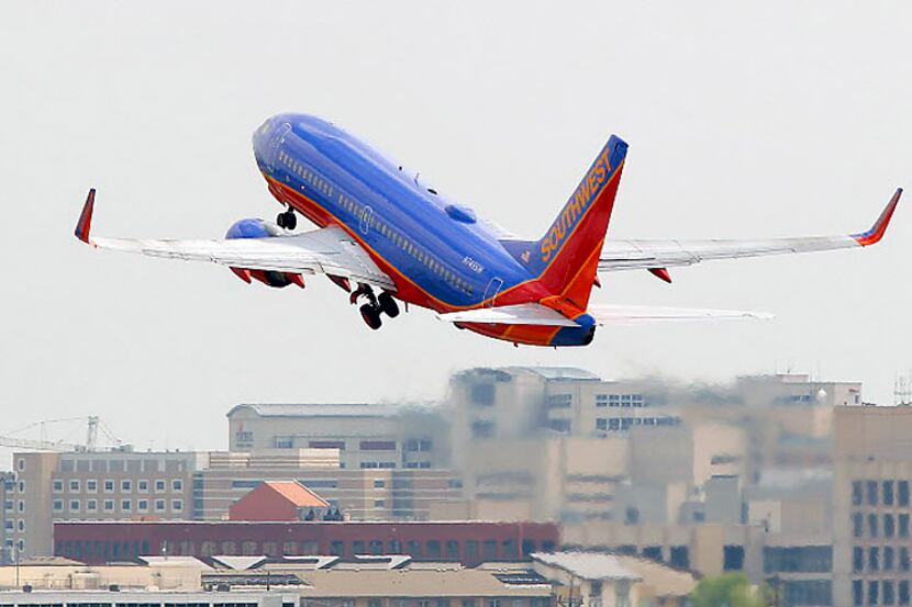 A Southwest Airlines plane takes off from Dallas Love Field. The airline on Thursday...