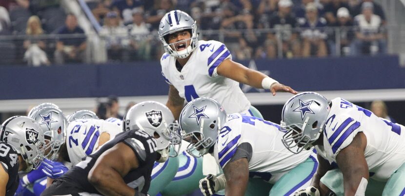 Dallas Cowboys Dak Prescott (4 ) calls the signal  during the 1st quarter of action of the...