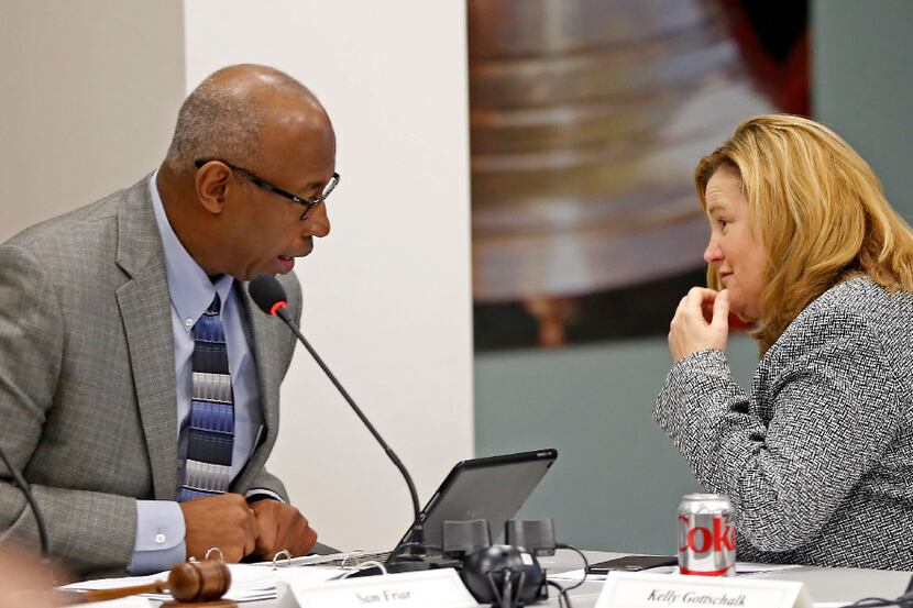 Executive Director Kelly Gottschalk (right) talks with Chairman Sam Friar during the Board...