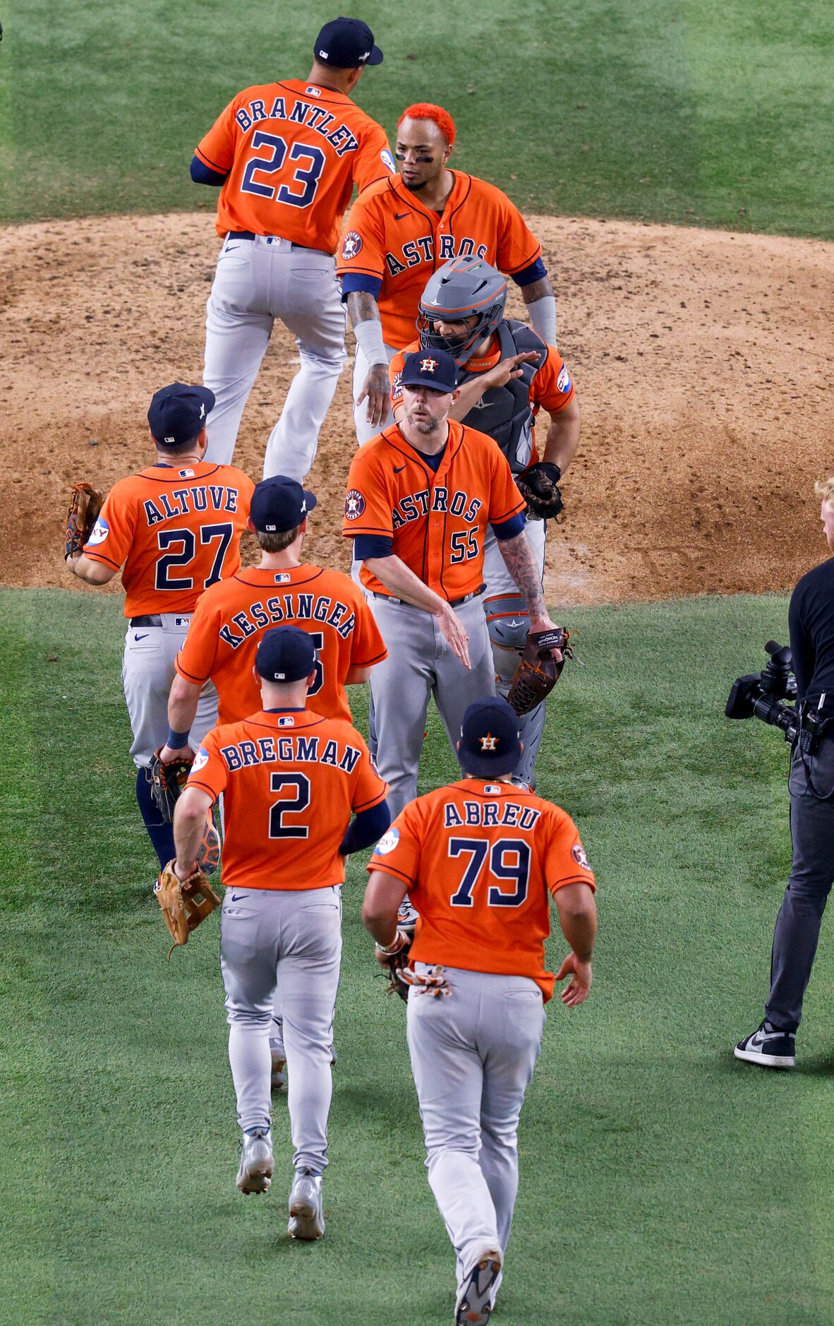 The Houston Astros celebrate after winning Game 5 of the American League Championship series...