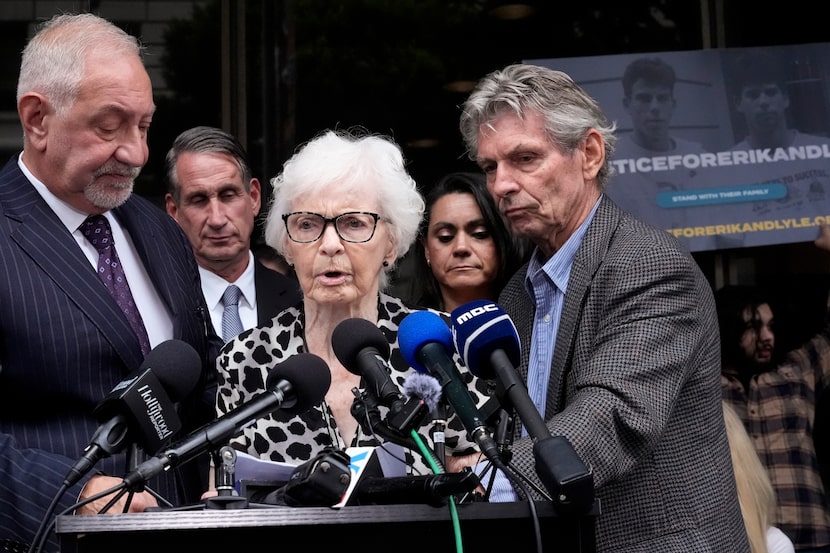 Kitty Menendez' sister, Joan Andersen VanderMolen, center, walks up to podium to make a...