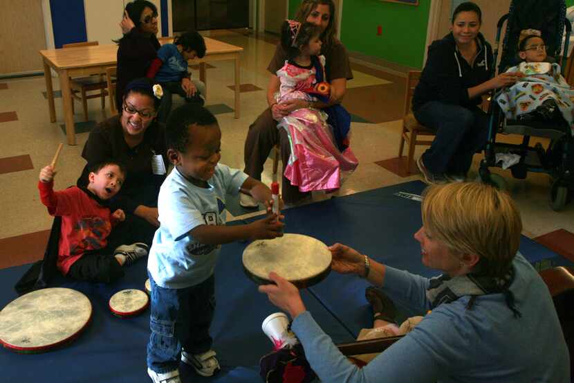 Children engage in music therapy in Dallas.