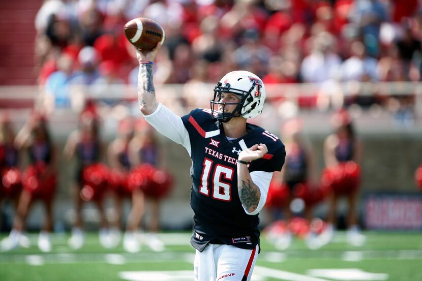 Texas Tech's Nic Shimonek (16) passes the ball during an NCAA college football game against...