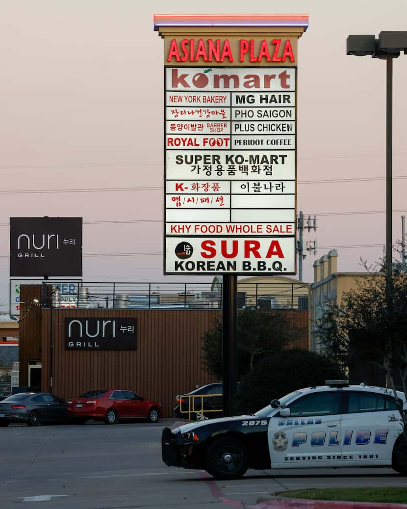 A sign advertises various Asian businesses at the Asiana Plaza along Royal Lane in Dallas....