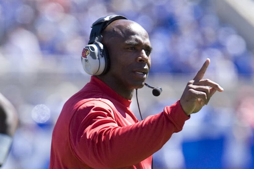 Texas' Charlie Strong during his time as Louisville head football coach from 2010-13. 