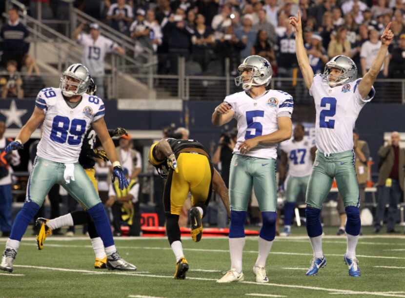 Dallas Cowboys kick holder Brian Moorman (2) reacts to Dallas Cowboys kicker Dan Bailey (5)...