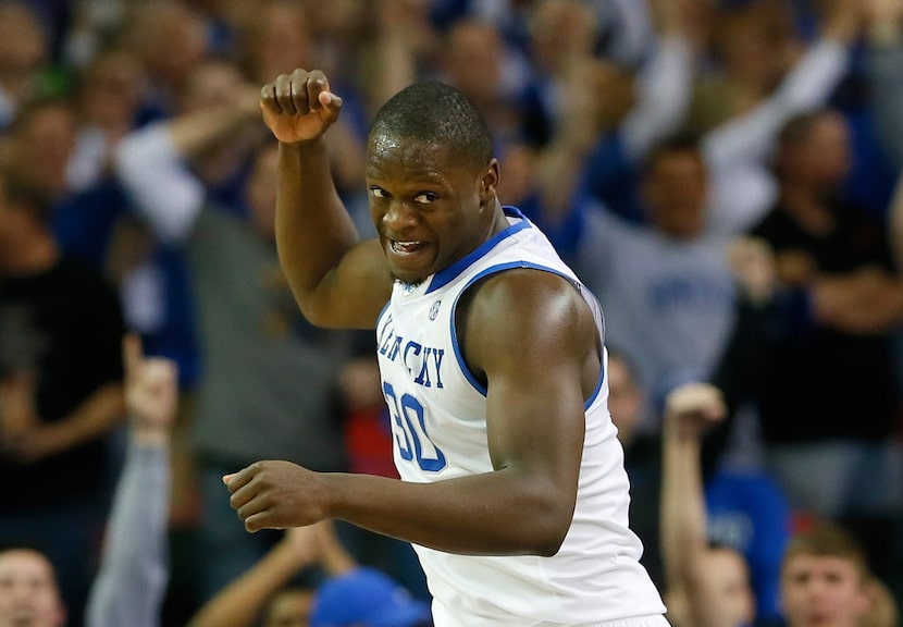 ATLANTA, GA - MARCH 14:  Julius Randle #30 of the Kentucky Wildcats reacts after a dunk...