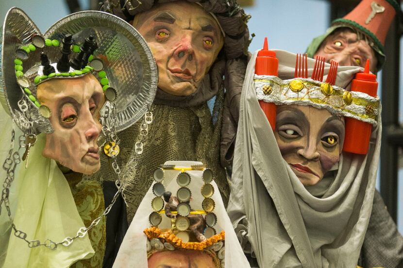 Court puppets can be seen during a rehearsal of the second act of Dallas Theater Center's...