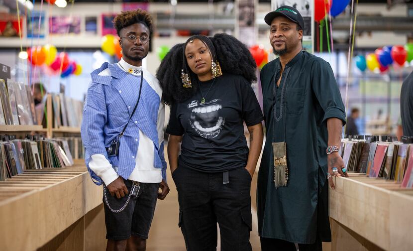 Truth To Power artists Cameron McCloud (left), Flower Child (center) and Keite Young pose...