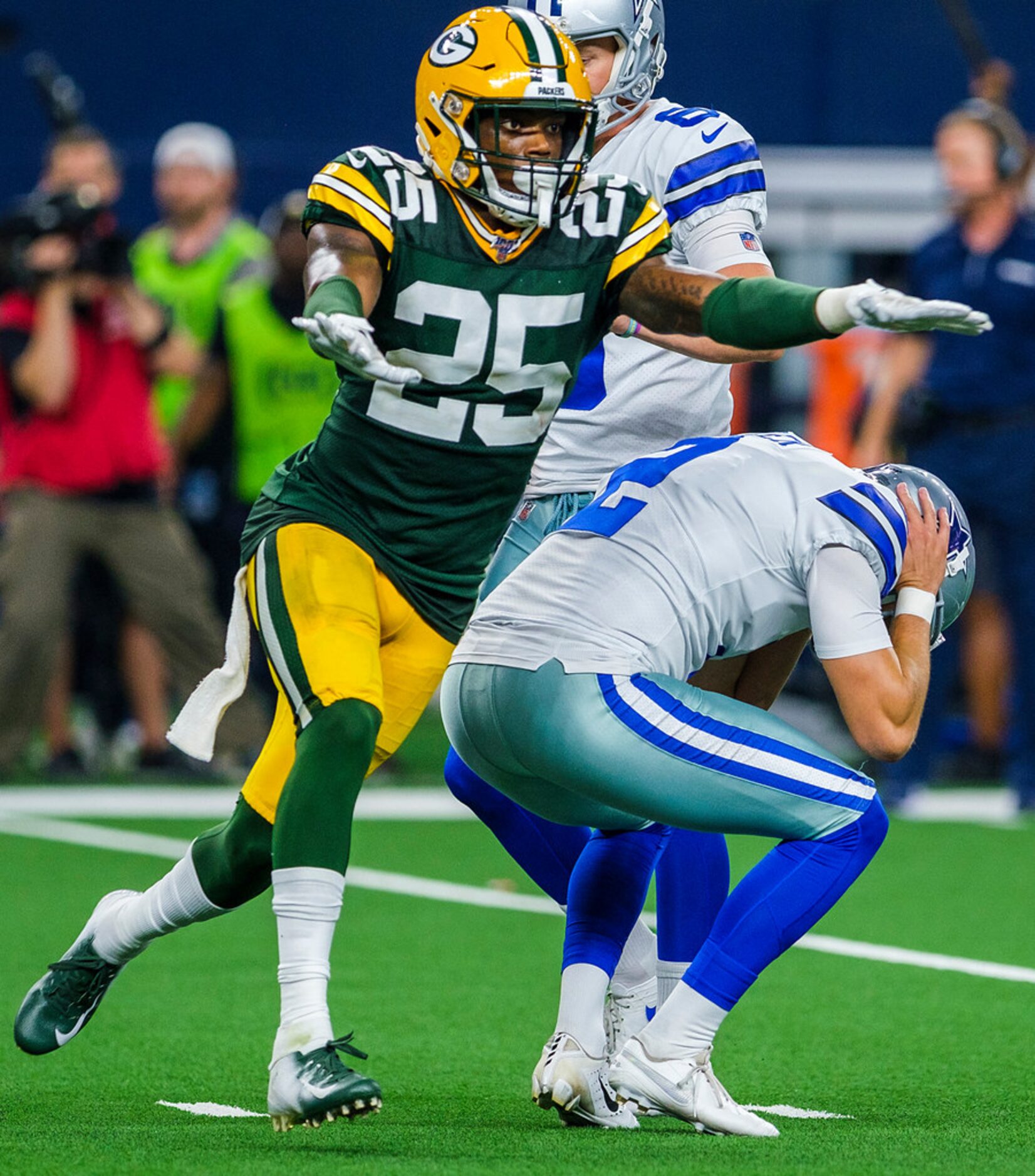 Green Bay Packers cornerback Josh Jackson (37) celebrates as Dallas Cowboys kicker Brett...