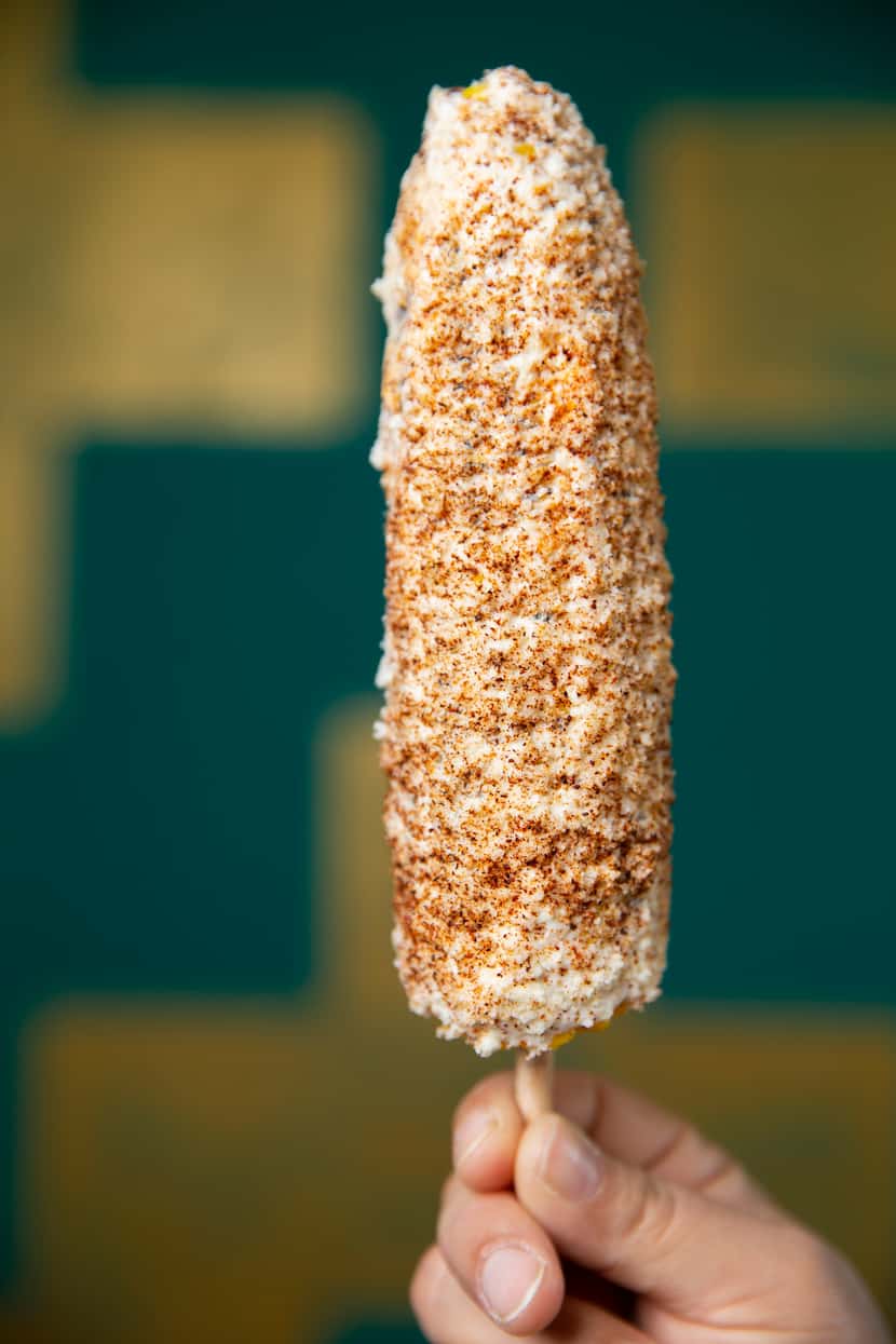 The traditional elote made with lime mayo, sour cream, cotija and chili powder 