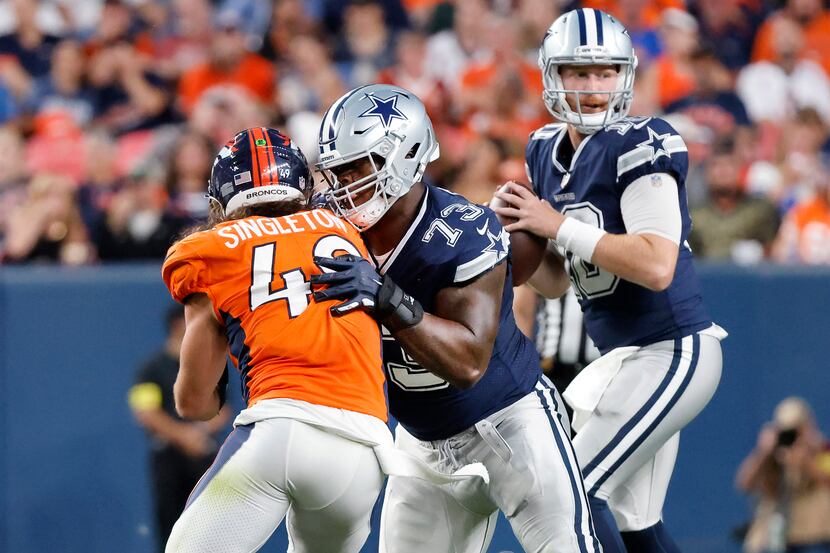Dallas Cowboys offensive tackle Tyler Smith (73) blocks Denver Broncos linebacker Alex...