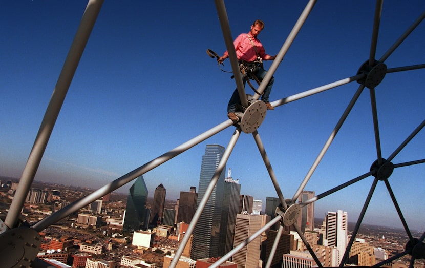 In November, 1995, John Prather of Sentry Electric balanced atop the outside of the Reunion...