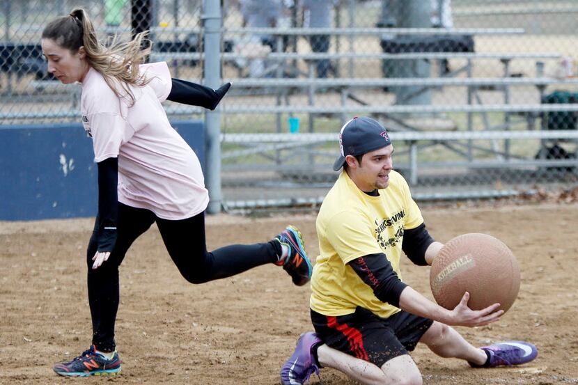 Megan Hayes scores a run as Brandon Poepping during last year's "Kicksgiving" kickball...