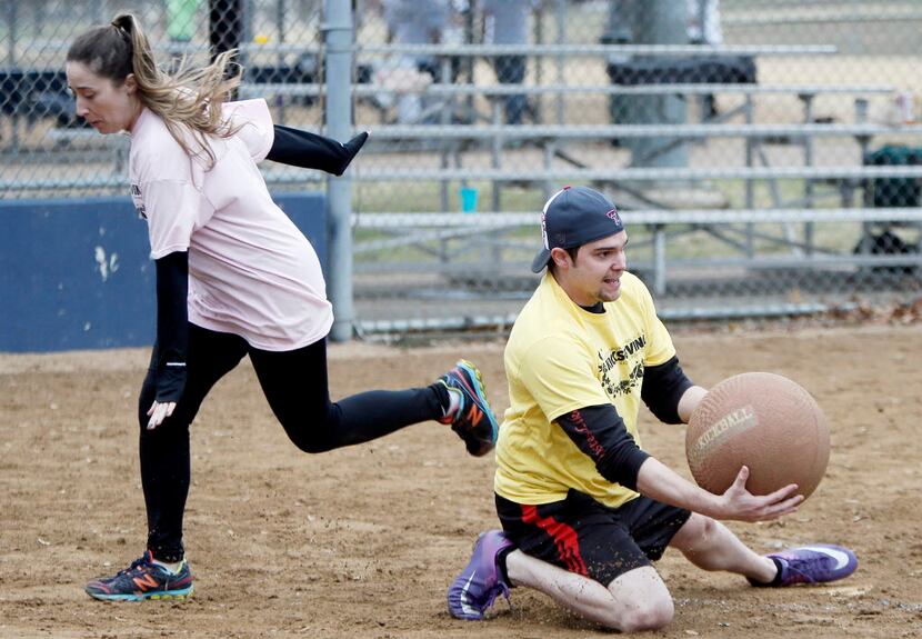 Megan Hayes scores a run as Brandon Poepping during last year's "Kicksgiving" kickball...