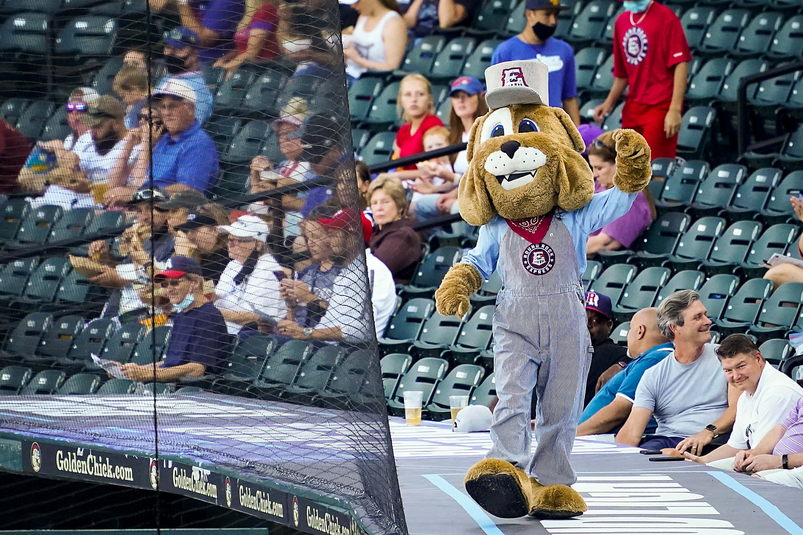 Round Rock Express mascot Spike encourages the crowd at Dell Diamond before the season...
