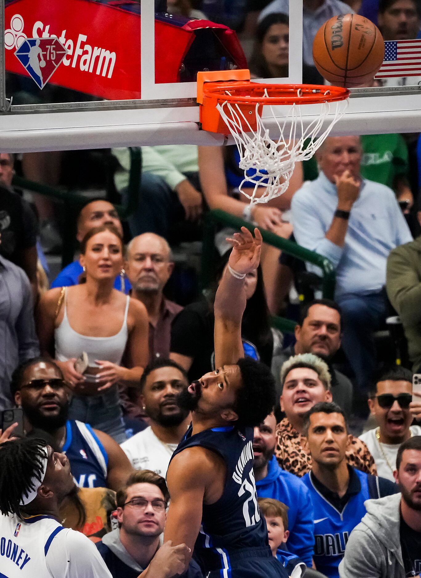 Dallas Mavericks guard Spencer Dinwiddie (26) looks back as his shot goes in past Golden...