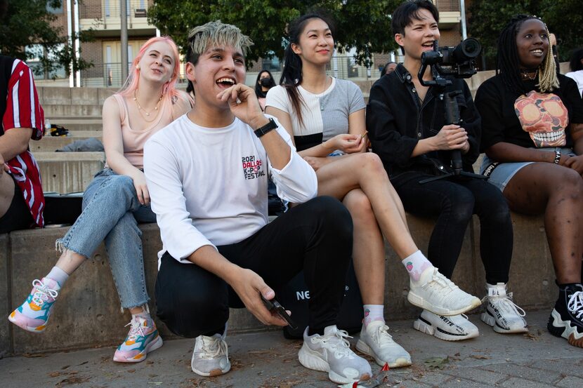 Members of K-pop cover dance team AEON watch a performance during their meetup at Vitruvian...