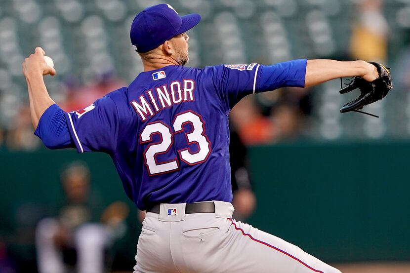 OAKLAND, CA - APRIL 22:  Mike Minor #23 of the Texas Rangers pitches against the Oakland...