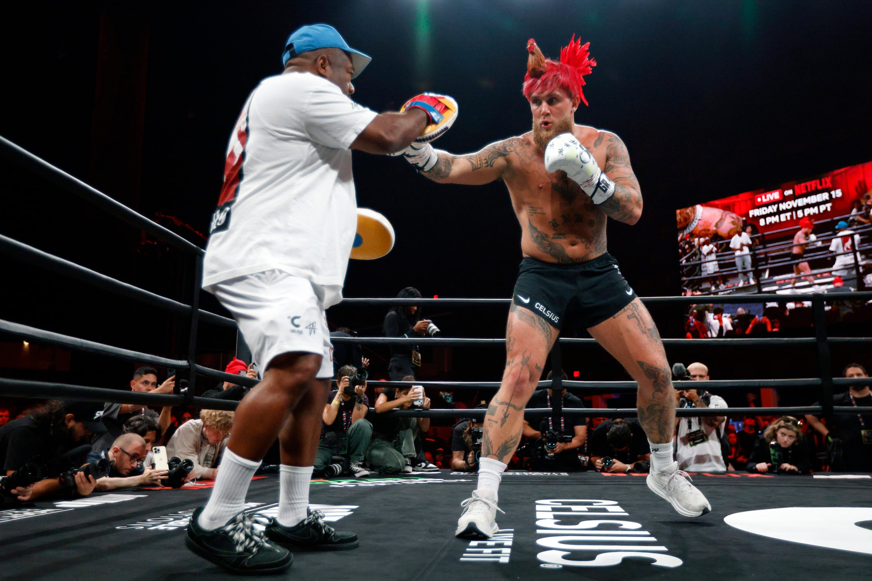 Jake Paul spars with a coach during an open workout ahead of his upcoming boxing bout...