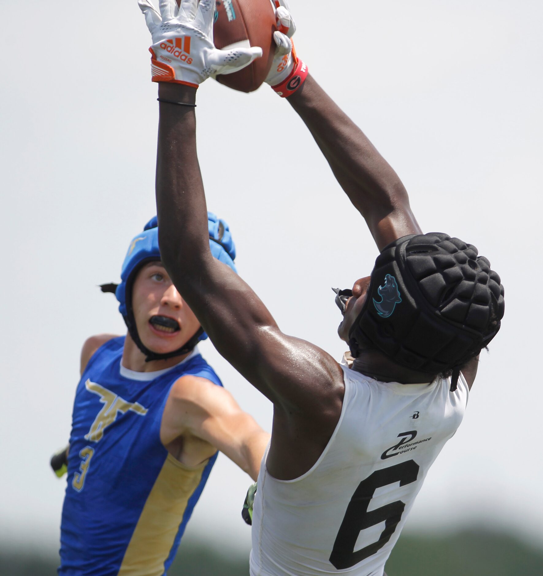 Frisco Panther Creek receiver Jalen Lott (6) leaps to pull in a long pass in front of a...