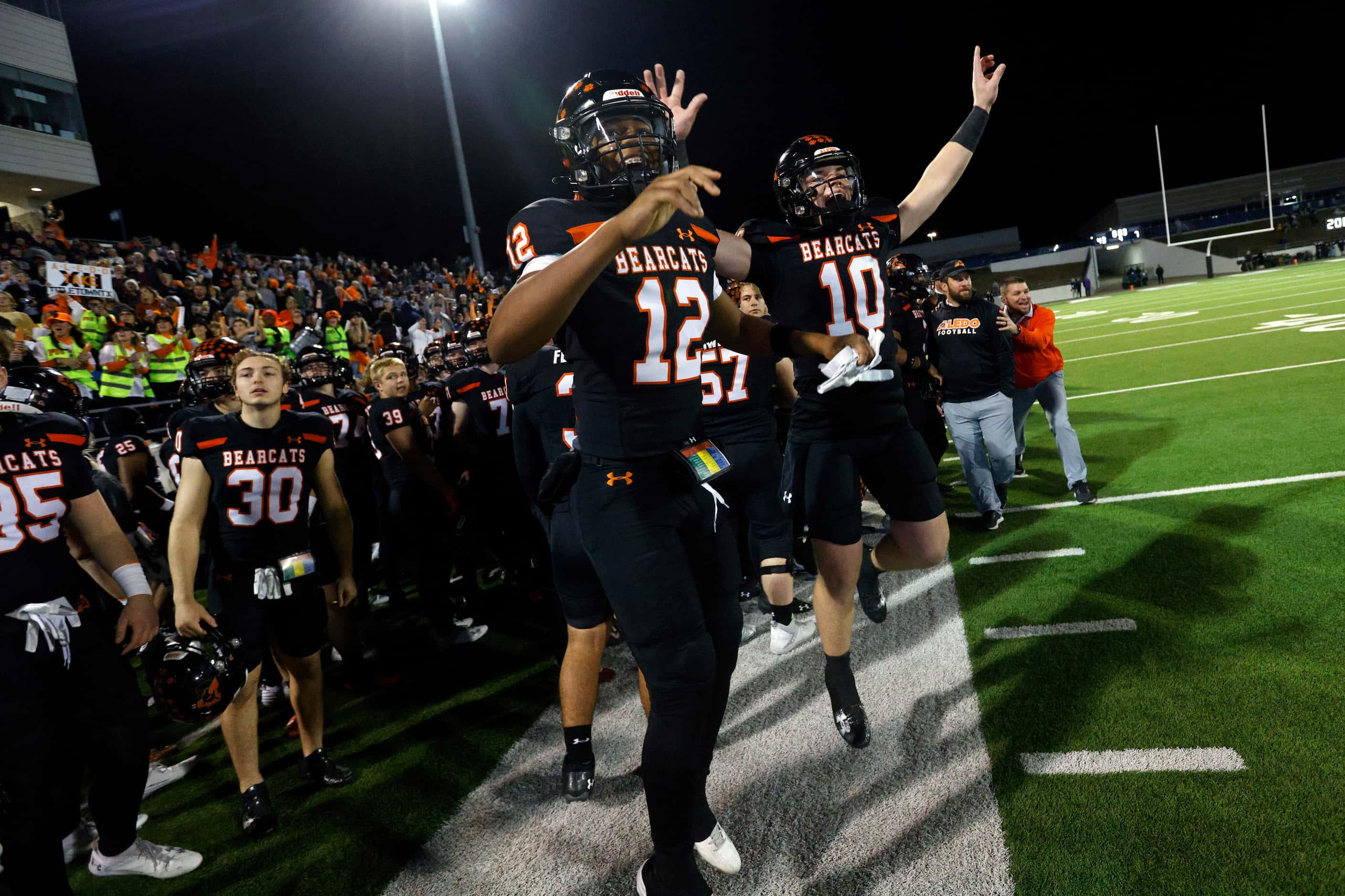 Aledo safety Lamel Swanson (12) and Aledo quarterback Gavin Beard (10) celebrate after...