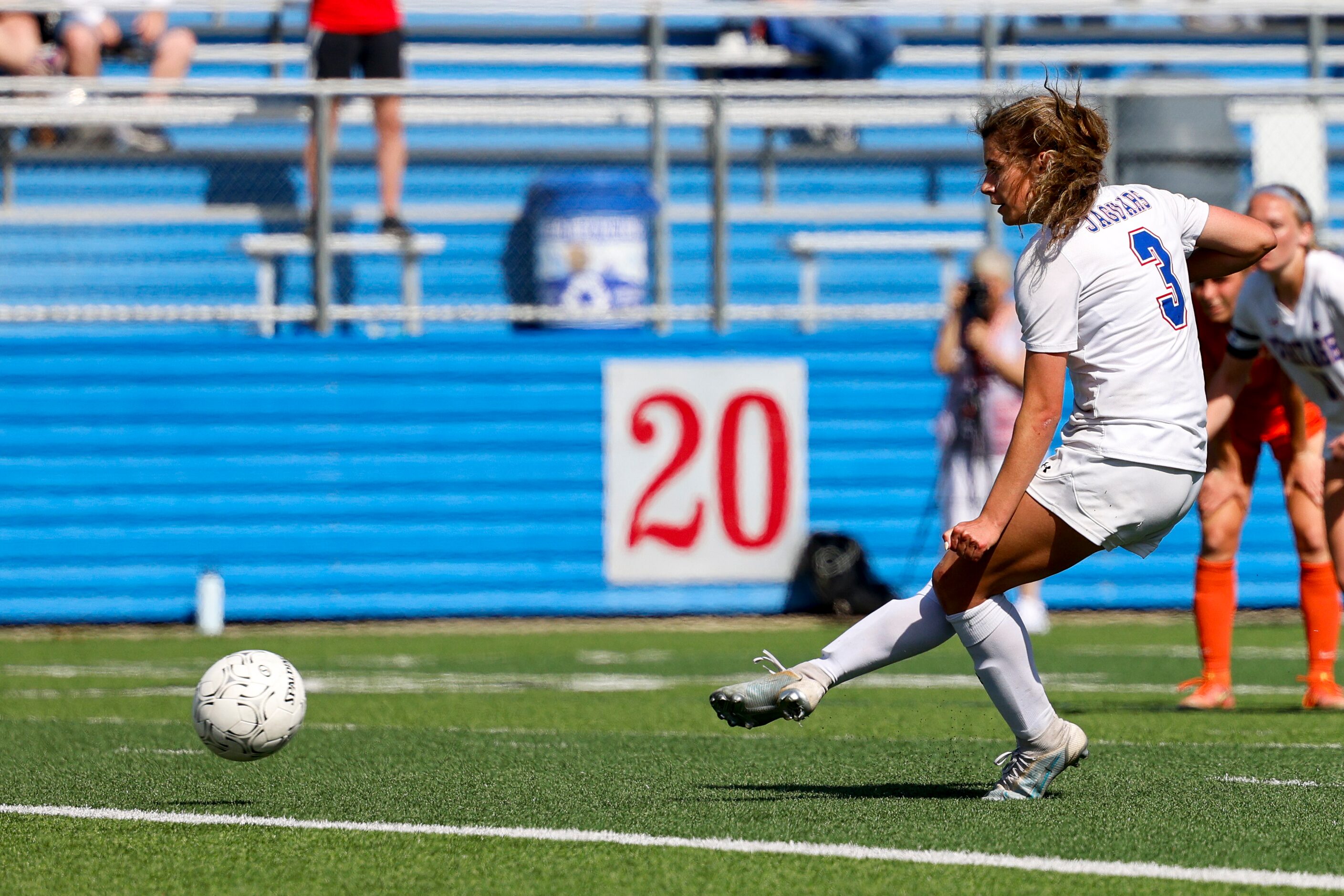 Midlothian Heritage midfielder Jules Burrows (3) scores on a penalty kick during overtime of...