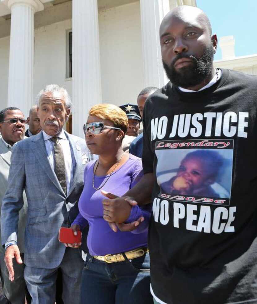 
Michael Brown Sr. and Lesley McSpadden, the victim’s parents, pleaded for peace Tuesday...