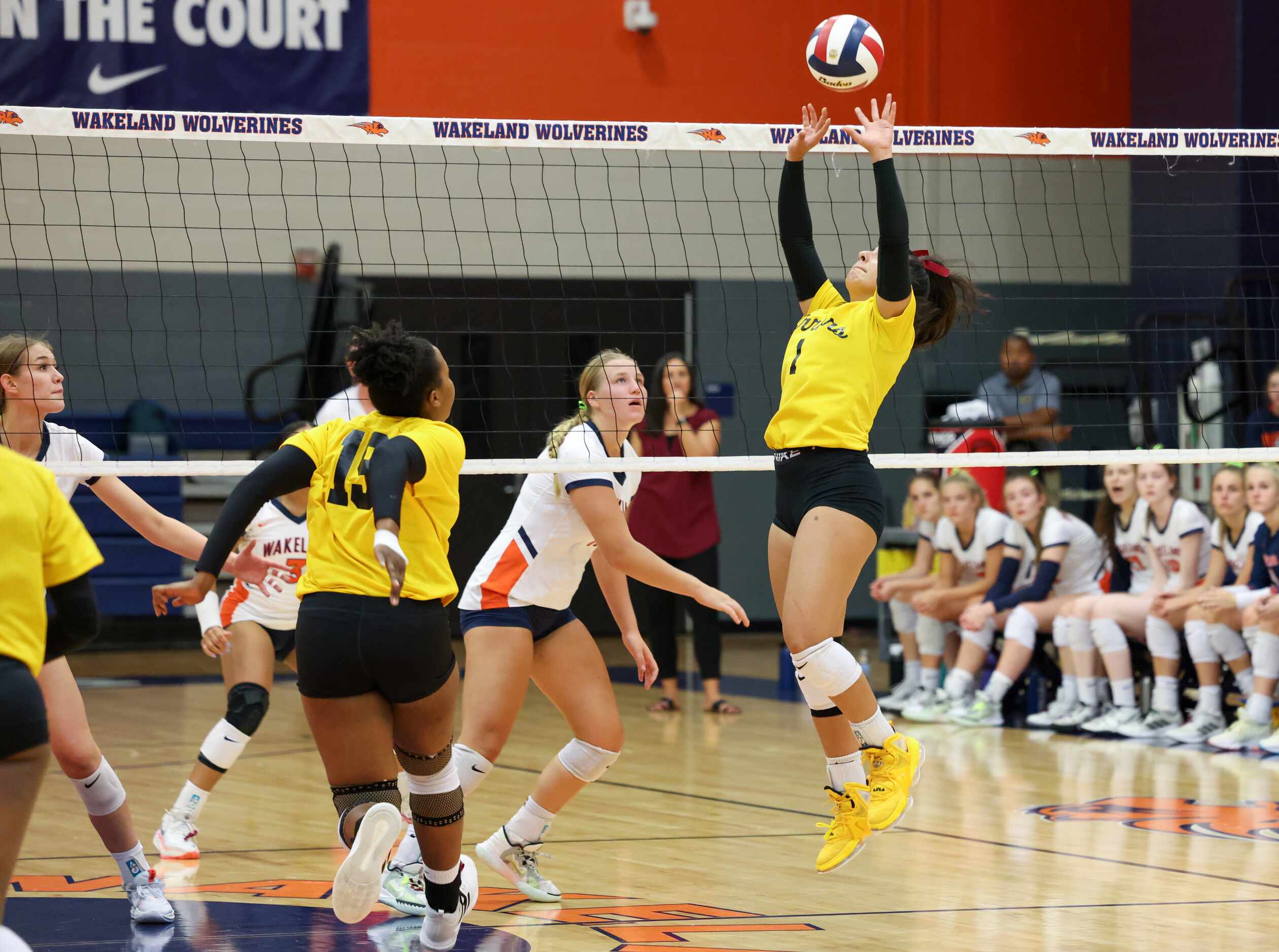 Frisco ISD’s Memorial High School Kiana Babaei (1) sets the ball during the first set of the...