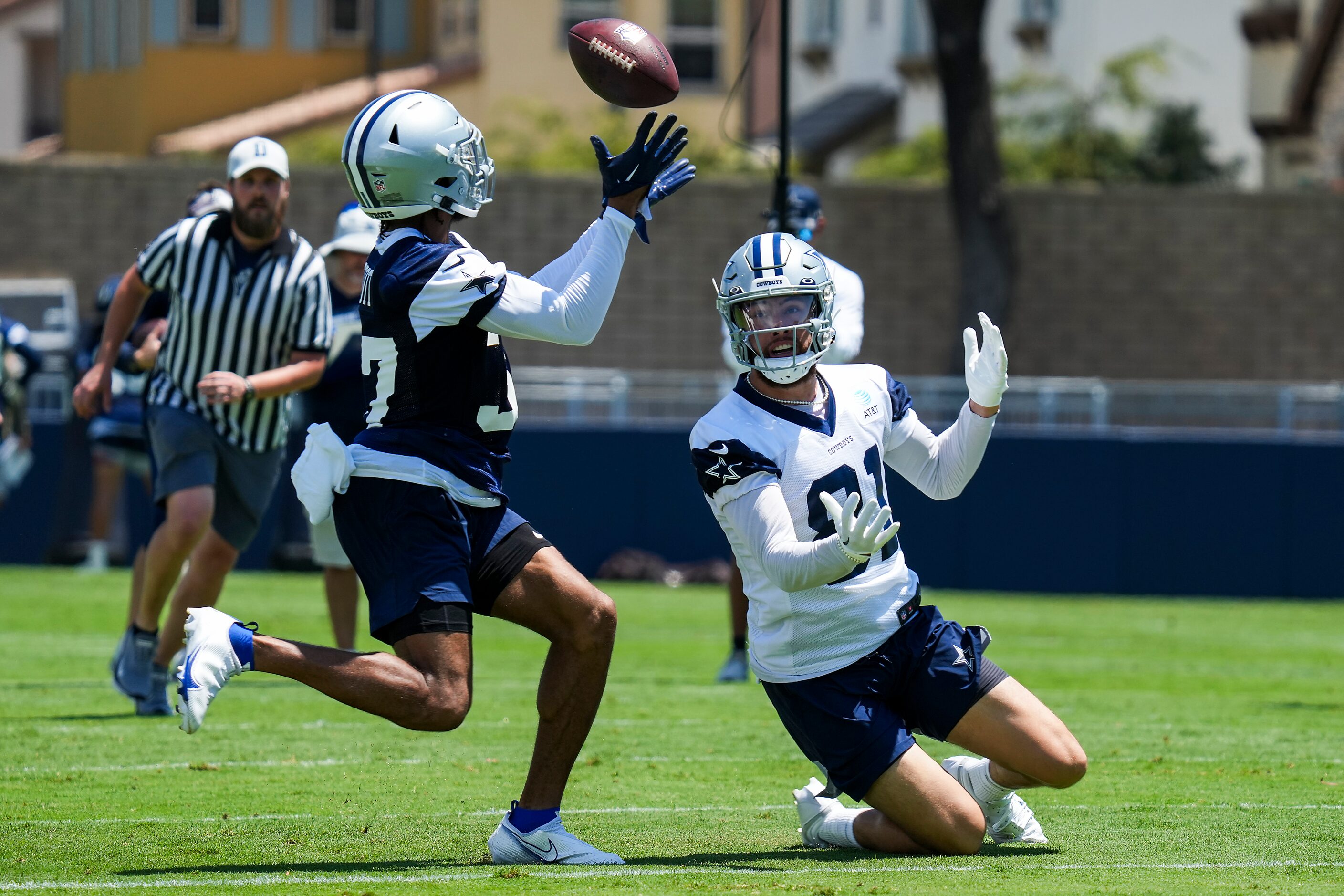 Dallas Cowboys cornerback Eric Scott Jr. (37) intercepts a pass intended for wide receiver...