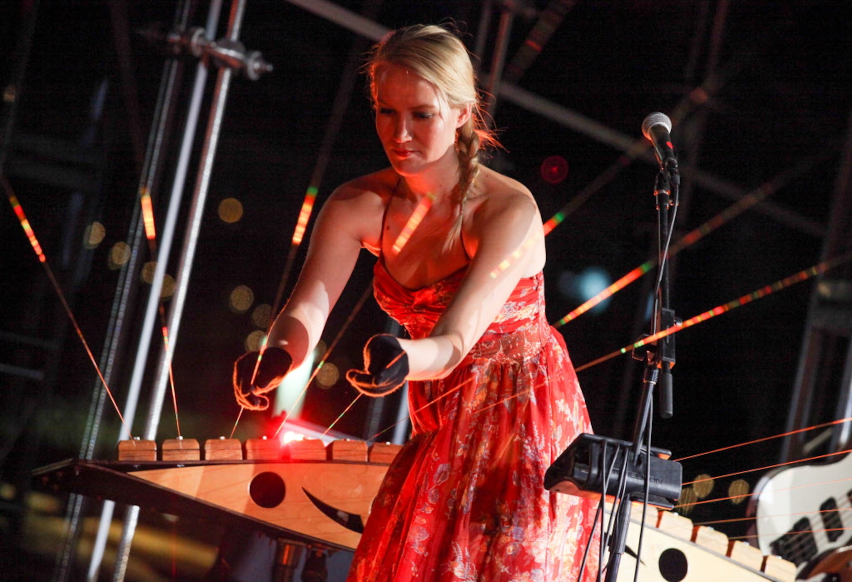 Katie Boeck plays the earth harp during the after-party for the "Night at the Museum 2012"...