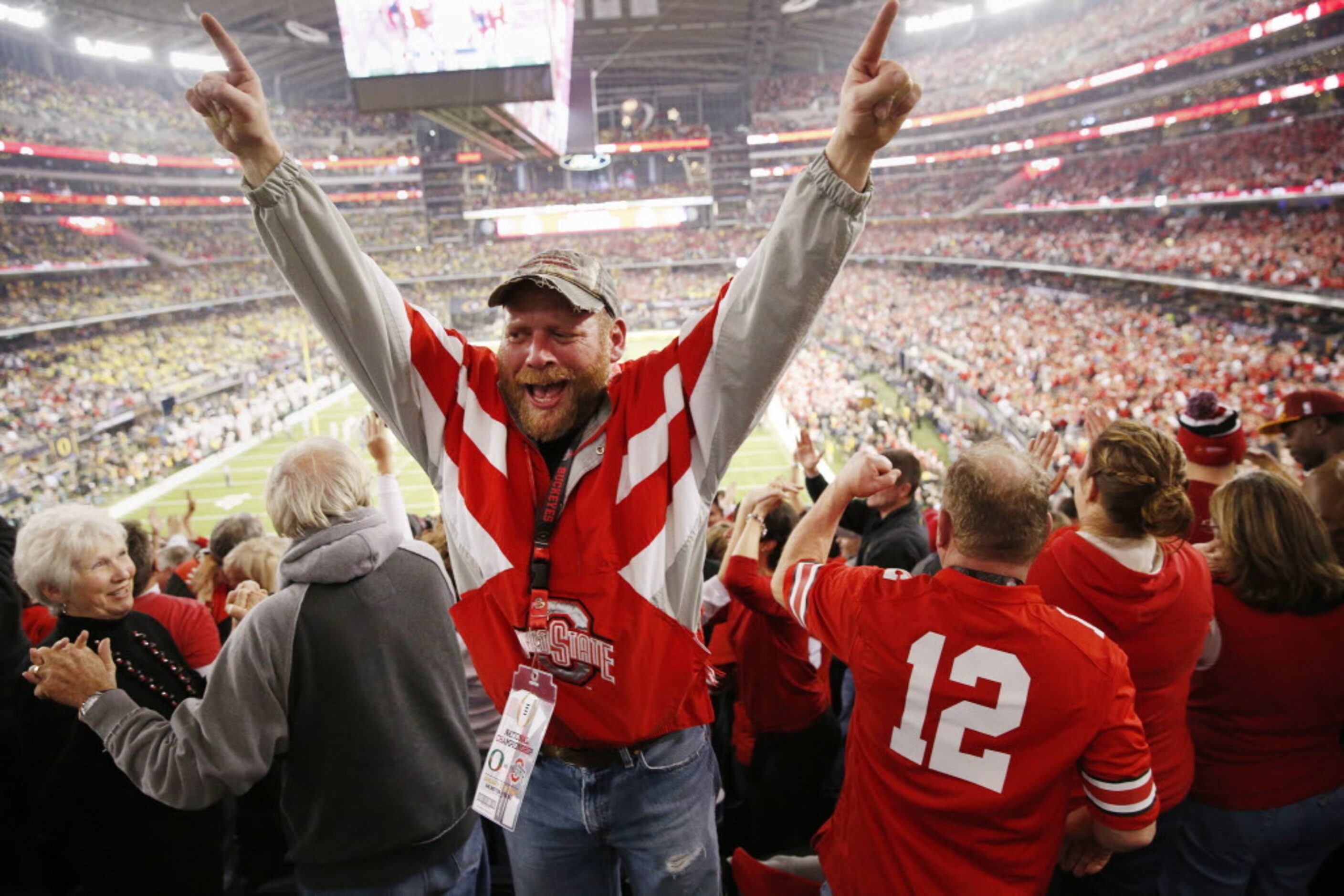 Ohio State Buckeyes fan Sean Bogan, of Pataskala, Ohio, celebrates after Ohio State stopped...